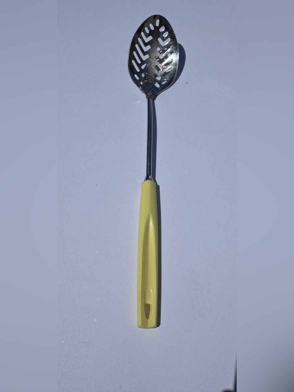 Vintage Ekco US Chromium Plated Slotted Spoon with Butter Yellow Handle 11"